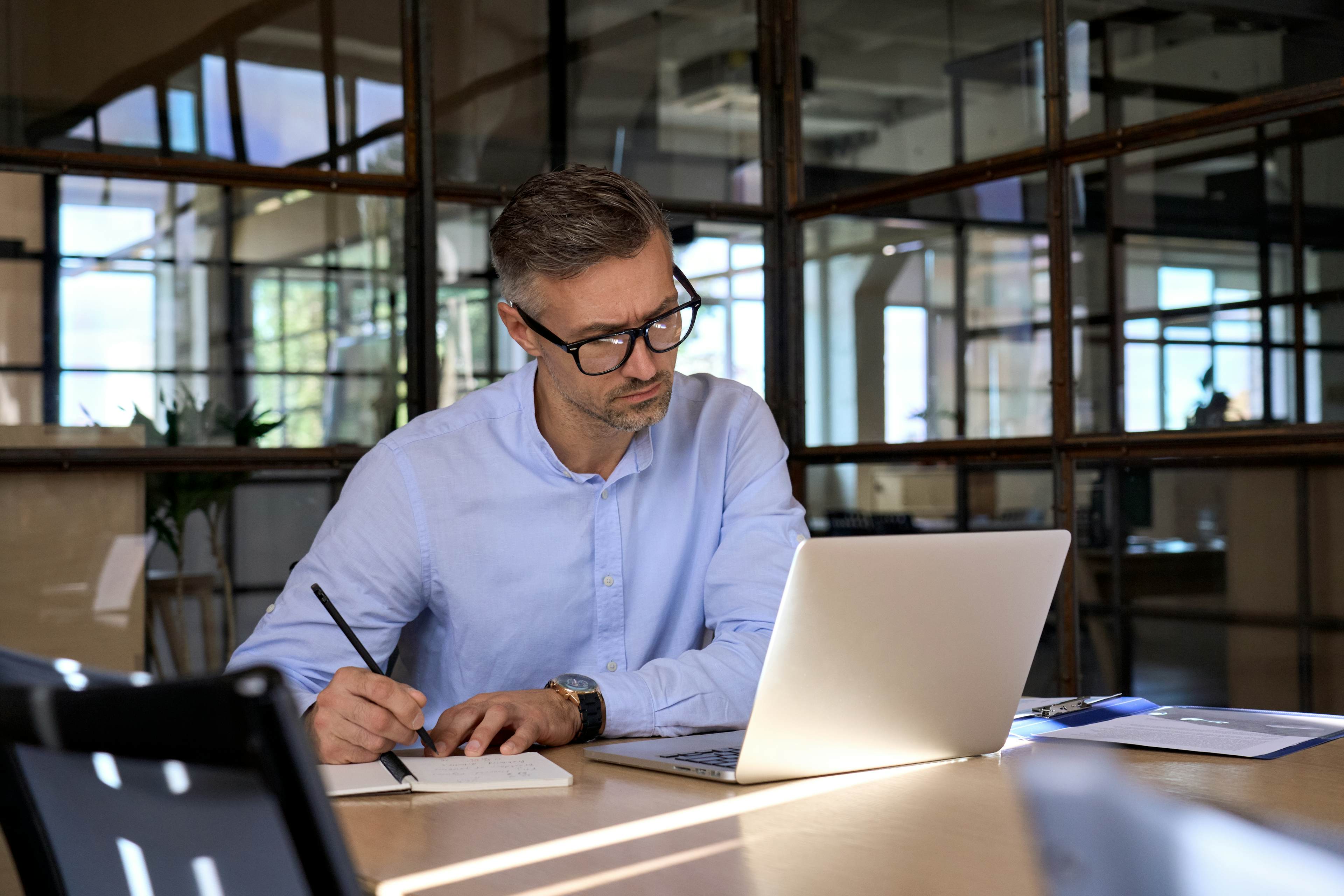 man working on laptop
