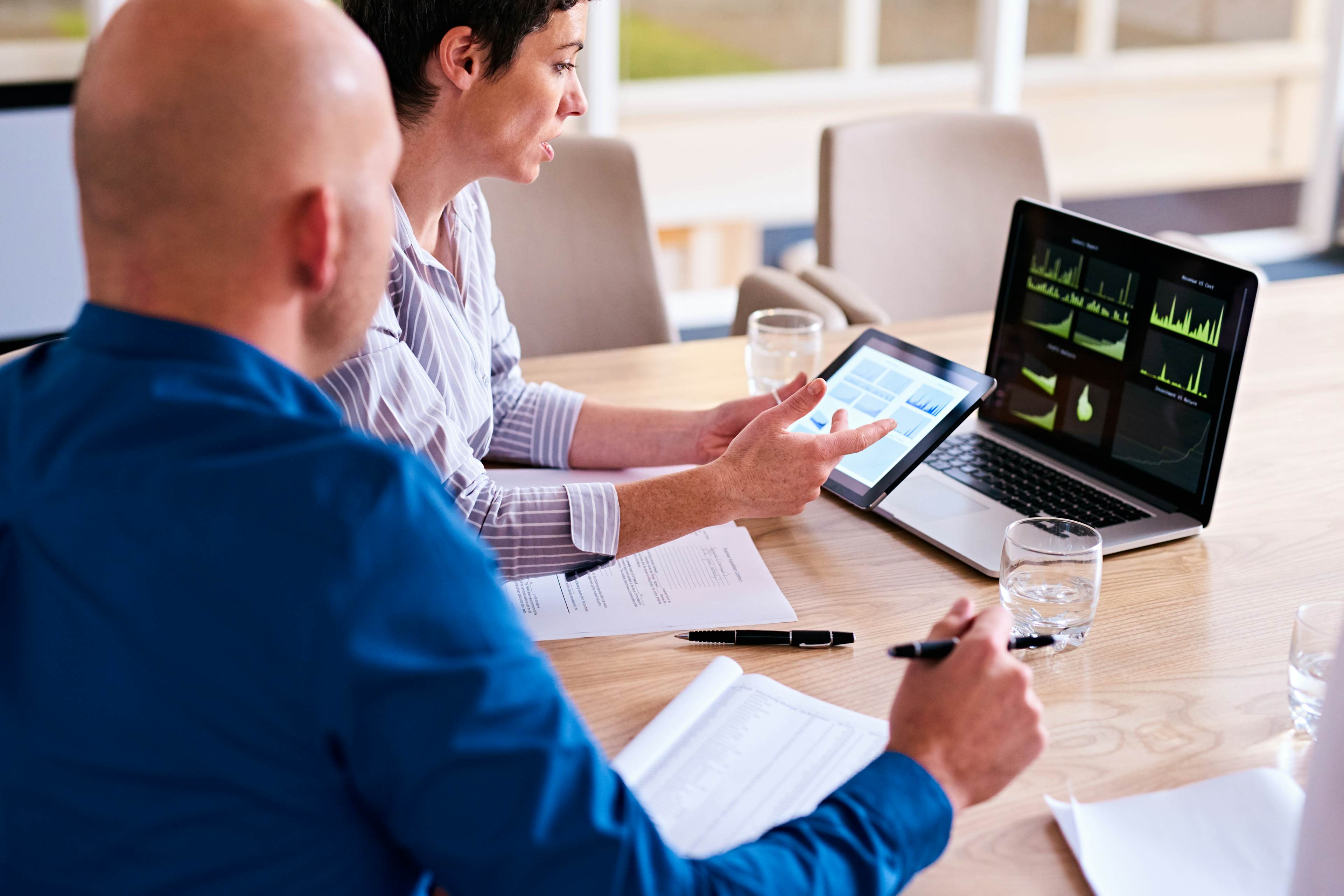 Business Professionals collaborating on a deal